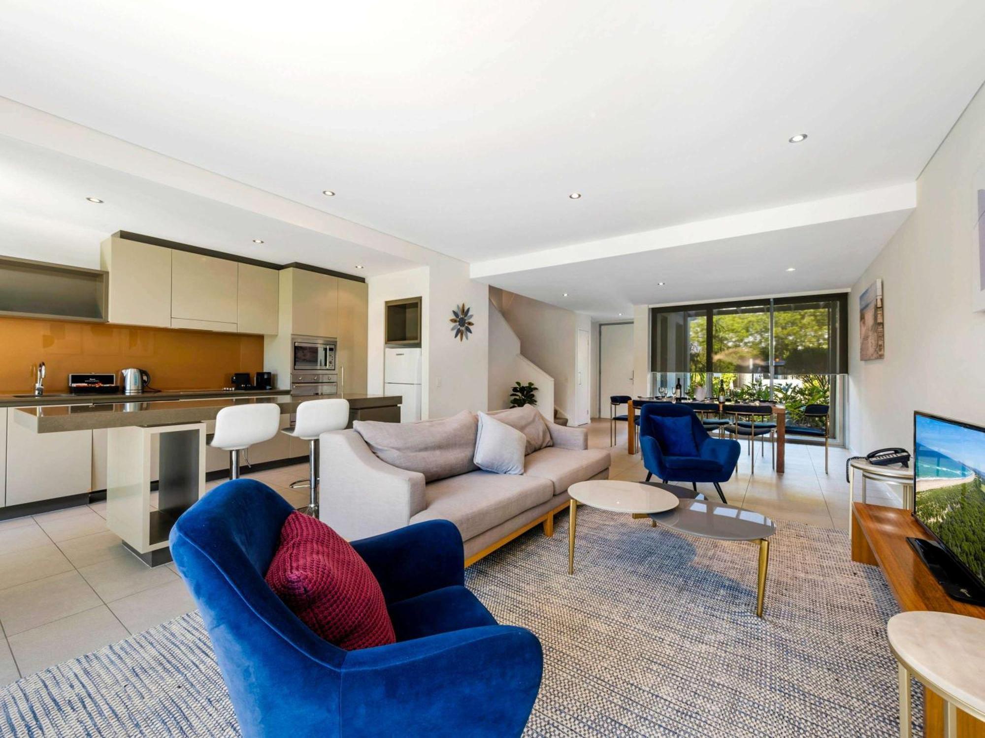 プルマン　マジェンタ　ショアーズ　リゾート ジ・エントランス エクステリア 写真 A living room in a typical apartment